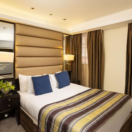 더 마블 아치 런던 외부 사진 A bedroom at the hotel