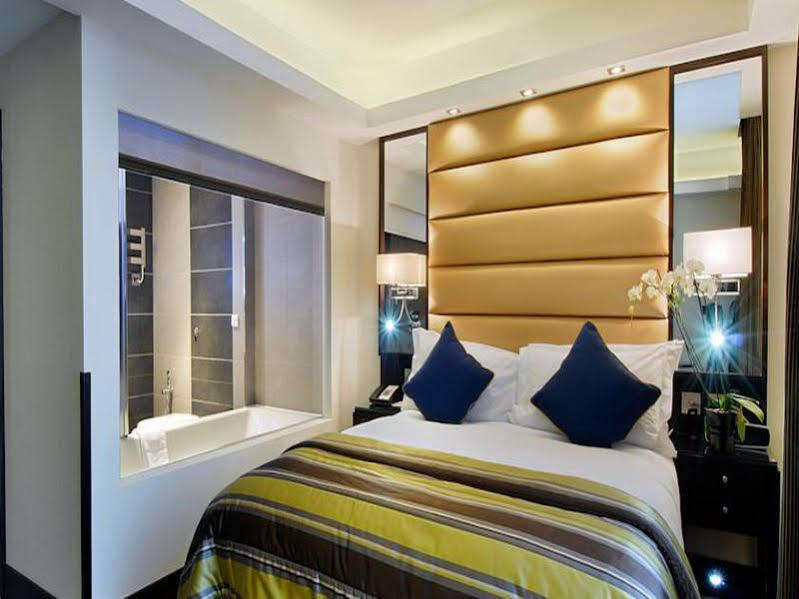 더 마블 아치 런던 외부 사진 A bedroom at the hotel